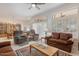 Living area with a view of the dining room and kitchen at 22915 N Wagon Wheel Dr, Sun City West, AZ 85375