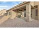 Covered patio with seating area and view of backyard at 22915 N Wagon Wheel Dr, Sun City West, AZ 85375