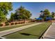 Bocce ball court with green surface at 23313 N De La Guerra Ct, Sun City West, AZ 85375