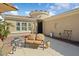 Charming courtyard with seating and desert landscaping at 23313 N De La Guerra Ct, Sun City West, AZ 85375