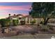 Beautiful desert landscape home with a landscaped front yard at 23313 N De La Guerra Ct, Sun City West, AZ 85375