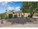 Single story house with desert landscaping and gated entry at 23313 N De La Guerra Ct, Sun City West, AZ 85375