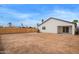 A large backyard with new perimeter fencing and a blank canvas for landscaping at 2345 W Monroe St # 4, Phoenix, AZ 85009