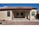 Covered patio with beige walls and brick flooring at 2471 E Jade Dr, Chandler, AZ 85286