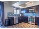 Modern kitchen featuring stainless steel appliances and mosaic backsplash at 2524 S El Paradiso Dr # 70, Mesa, AZ 85202