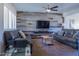 Living room with wood-look wall accent and comfortable seating at 2524 S El Paradiso Dr # 70, Mesa, AZ 85202