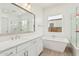 Spa-like bathroom with soaking tub and quartz countertop at 2553 E Virginia Cir, Mesa, AZ 85213