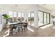 Bright dining area with sliding glass doors leading to the backyard at 2553 E Virginia Cir, Mesa, AZ 85213