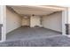 Two-car garage with extra storage space and epoxy floor at 2553 E Virginia Cir, Mesa, AZ 85213