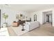 Living room with hardwood floors, neutral tones, and natural light at 2553 E Virginia Cir, Mesa, AZ 85213