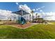 playground with shade structure and landscaping at 2607 E Virginia Cir, Mesa, AZ 85213