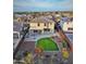 Aerial view of two-story house with backyard and pool; mountain views in background at 29405 W Columbus Ave, Buckeye, AZ 85396