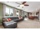 Open living room with a view into the kitchen at 29405 W Columbus Ave, Buckeye, AZ 85396