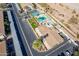 Aerial view of community pool, spa, and parking at 3270 S Goldfield Rd # 816, Apache Junction, AZ 85119