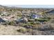 Scenic aerial view of the community features lush landscaping and luxurious homes with pools at 3439 E Tonto Dr, Phoenix, AZ 85044