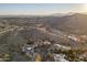 High-altitude view shows the picturesque neighborhood with its winding roads and mountain views at 3439 E Tonto Dr, Phoenix, AZ 85044