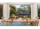 Dining area features a backyard view of the pool, desert landscaping and a peek of the mountain at 3439 E Tonto Dr, Phoenix, AZ 85044