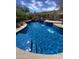 Sparkling pool surrounded by lush landscaping providing a private and refreshing retreat at 3439 E Tonto Dr, Phoenix, AZ 85044