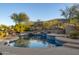 Backyard pool with desert landscaping and mountain views at 3439 E Tonto Dr, Phoenix, AZ 85044