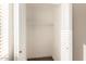 Spacious closet with wood-look floors and hanging rod at 3511 E Baseline Rd # 1206, Phoenix, AZ 85042