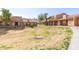 View of community with grassy area and walkways at 3511 E Baseline Rd # 1206, Phoenix, AZ 85042