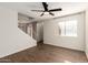 Bright living room with hardwood floors and ceiling fan at 3511 E Baseline Rd # 1206, Phoenix, AZ 85042