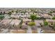 An aerial view of a community showcasing well-maintained homes with lush landscaping and mature trees in a neighborhood at 3843 E Old Stone N Cir, Chandler, AZ 85249