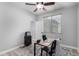 Bedroom featuring a functional workspace, closet, and cozy lighting, perfect for a home office at 3843 E Old Stone N Cir, Chandler, AZ 85249