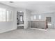 Neutral hallway features carpet, windows, and rod iron railing to the lower level at 3843 E Old Stone N Cir, Chandler, AZ 85249