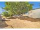 Large backyard with toys and a tree at 3925 W San Juan Ave, Phoenix, AZ 85019