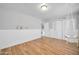 bedroom with wood floors and baby swing at 3925 W San Juan Ave, Phoenix, AZ 85019