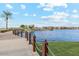 Wooden walkway along the lake with scenic views at 39995 W Agave Rd, Maricopa, AZ 85138