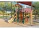 Playground with shaded structure and play equipment at 39995 W Agave Rd, Maricopa, AZ 85138