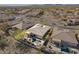 Lovely aerial view of backyard with swimming pool and mountain views in desert at 42225 N Celebration Way, Phoenix, AZ 85086