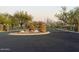 The Landing gated community entrance with stone pillars and decorative iron gates at 42225 N Celebration Way, Phoenix, AZ 85086