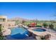 Beautiful pool and spa area with desert landscaping and picturesque mountain backdrop at 42225 N Celebration Way, Phoenix, AZ 85086