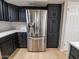 Stainless steel refrigerator in a modern kitchen setting at 4303 E Cactus Rd # 128, Phoenix, AZ 85032