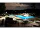 Relaxing nighttime view of the community pool area at 4303 E Cactus Rd # Apt 128, Phoenix, AZ 85032