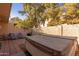 Private backyard with hot tub, grill, and seating at 518 E Colgate Dr, Tempe, AZ 85283