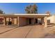 Tan colored exterior with carport and small front yard at 518 E Colgate Dr, Tempe, AZ 85283