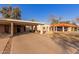 Exterior view showing multiple units with carports at 518 E Colgate Dr, Tempe, AZ 85283