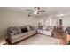 Living room with grey sofas and view of dining area at 518 E Colgate Dr, Tempe, AZ 85283