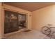 Private patio with sliding glass door access and bike storage at 518 E Colgate Dr, Tempe, AZ 85283