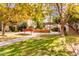 Landscaped courtyard with benches and trees at 5525 E Thomas Rd # M15, Phoenix, AZ 85018