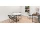 Small dining area with round table and four metal chairs at 5525 E Thomas Rd # M15, Phoenix, AZ 85018