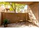 Private patio with seating and small plants at 5525 E Thomas Rd # M15, Phoenix, AZ 85018