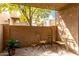 Private patio with seating and small plants at 5525 E Thomas Rd # M15, Phoenix, AZ 85018