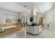 Luxury bathroom with a soaking tub, dual vanities, and modern finishes throughout at 6039 E Laurel Ln, Scottsdale, AZ 85254