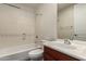 Bathroom with tub, toilet and wood vanity at 6067 E Knolls S Way, Cave Creek, AZ 85331