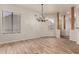 Bright dining room with hardwood floors and chandelier at 6067 E Knolls S Way, Cave Creek, AZ 85331